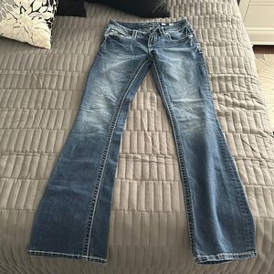 Miss Me Jeans size 26 bootcut mid rise no stains inseam is 34